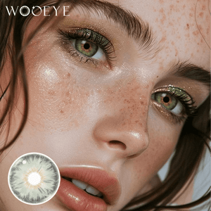 The girl's face is looking straight ahead, the upper left is the Wooeye logo, and the lower left is a close-up of the Mermaid Green contact lens