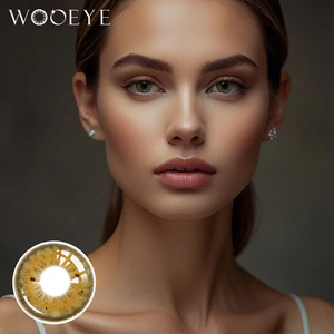 The girl's face is looking straight ahead, the upper left is the Wooeye logo, and the lower left is a close-up of the Magic Brown contact lens