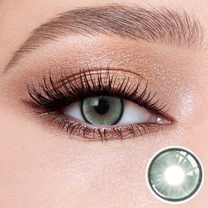 The effect of wearing Boston Green Contact Lenses, with a close-up of the product in the lower right corner