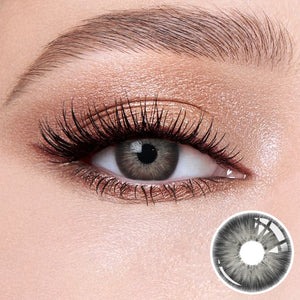 The effect of wearing Pattaya Grey Contact Lenses, with a close-up of the product in the lower right corner