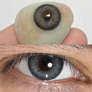 Close-up of the eye and product wearing Magic Grey Contact Lenses