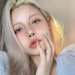 Model wearing Magic Blue Contact Lenses