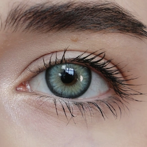 Close-up of eyes wearing Diamond Green II Contact Lenses