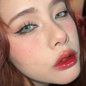 Model wearing Transform Green Contact Lenses