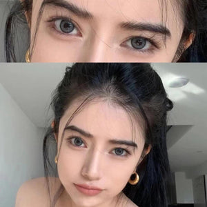 Close-up of the model's face and eyes wearing Magic Grey Contact Lenses