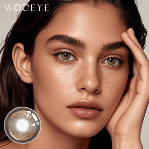 The girl's face is looking straight ahead, the upper left is the Wooeye logo, and the lower left is a close-up of the tides brown contact lens