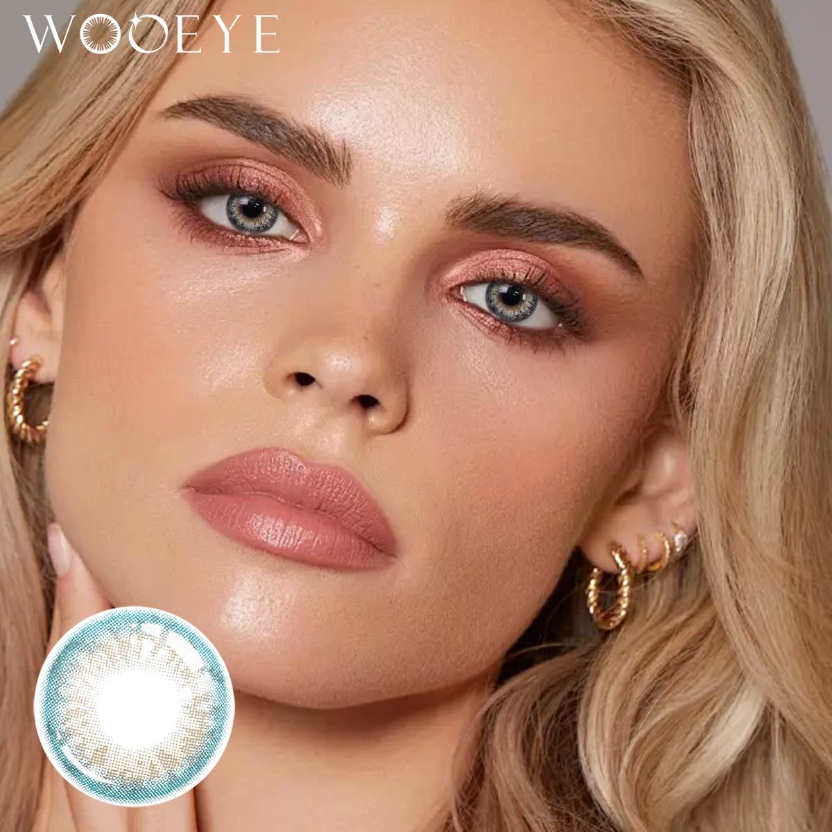 The girl's face is looking straight ahead, the upper left is the Wooeye logo, and the lower left is a close-up of the Angel Blue contact lens