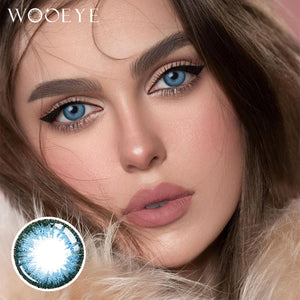 Model wearing Deep Ocean Blue Contact Lenses