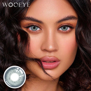 Model wearing Charm Green Contact Lenses