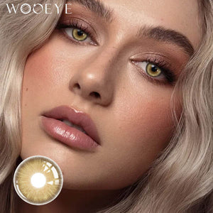 The girl's face is looking straight ahead, the upper left is the Wooeye logo, and the lower left is a close-up of the Space Brown contact lens