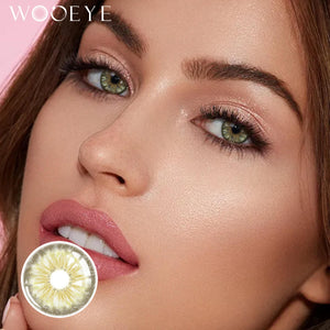The girl's face is looking straight ahead, the upper left is the Wooeye logo, and the lower left is a close-up of the Chamer Grey contact lens