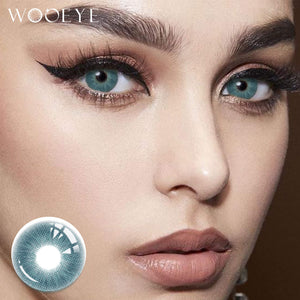 The girl's face is looking straight ahead, the upper left is the Wooeye logo, and the lower left is a close-up of the love blue contact lens