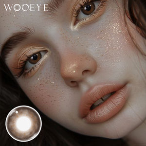 Model wearing Mystery Tea Brown Contact Lenses