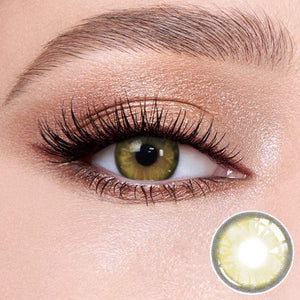 Gem Brown contact lenses on the eyes, close-up of the product on the lower right