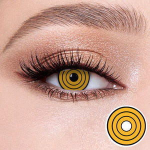 The effect of wearing Bat III Contact Lenses, with a close-up of the product in the lower right corner