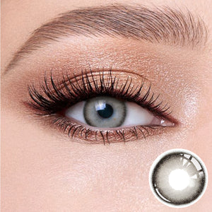 The effect of wearing Black Pearl Gray Contact Lenses, with a close-up of the product in the lower right corner