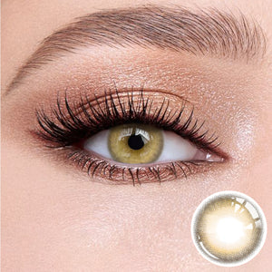 The effect of wearing Caramel Brown Contact Lenses, with a close-up of the product in the lower right corner