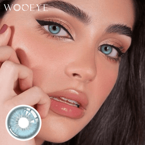 The girl's face is looking straight ahead, the upper left is the Wooeye logo, and the lower left is a close-up of the CasaBlue contact lens