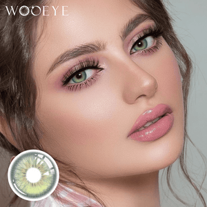 The girl's face is looking straight ahead, the upper left is the Wooeye logo, and the lower left is a close-up of the Casa Green contact lens