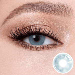 Clouds Blue contact lenses on the eyes, close-up of the product on the lower right