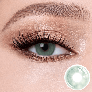 CloudsGreen contact lenses on the eyes, close-up of the product on the lower right