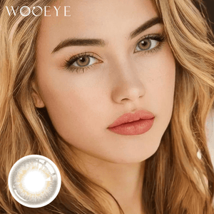 The girl's face is looking straight ahead, the upper left is the Wooeye logo, and the lower left is a close-up of the Dew Gray contact lens