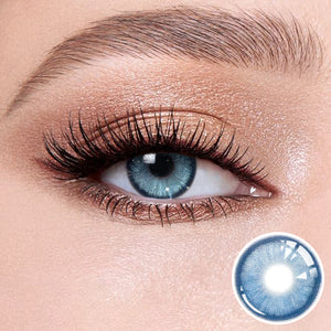The effect of wearing Diamond Blue I Contact Lenses, with a close-up of the product in the lower right corner