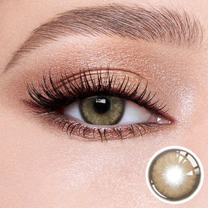 The effect of wearing Diamond Brown I Contact Lenses, with a close-up of the product in the lower right corner