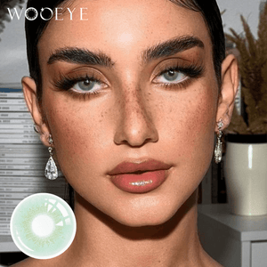 The girl's face is looking straight ahead, the upper left is the Wooeye logo, and the lower left is a close-up of the Glacier Green contact lens