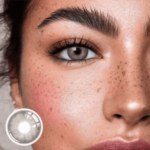 The girl's face is looking straight ahead, the upper left is the Wooeye logo, and the lower left is a close-up of the Irish.Gray contact lens