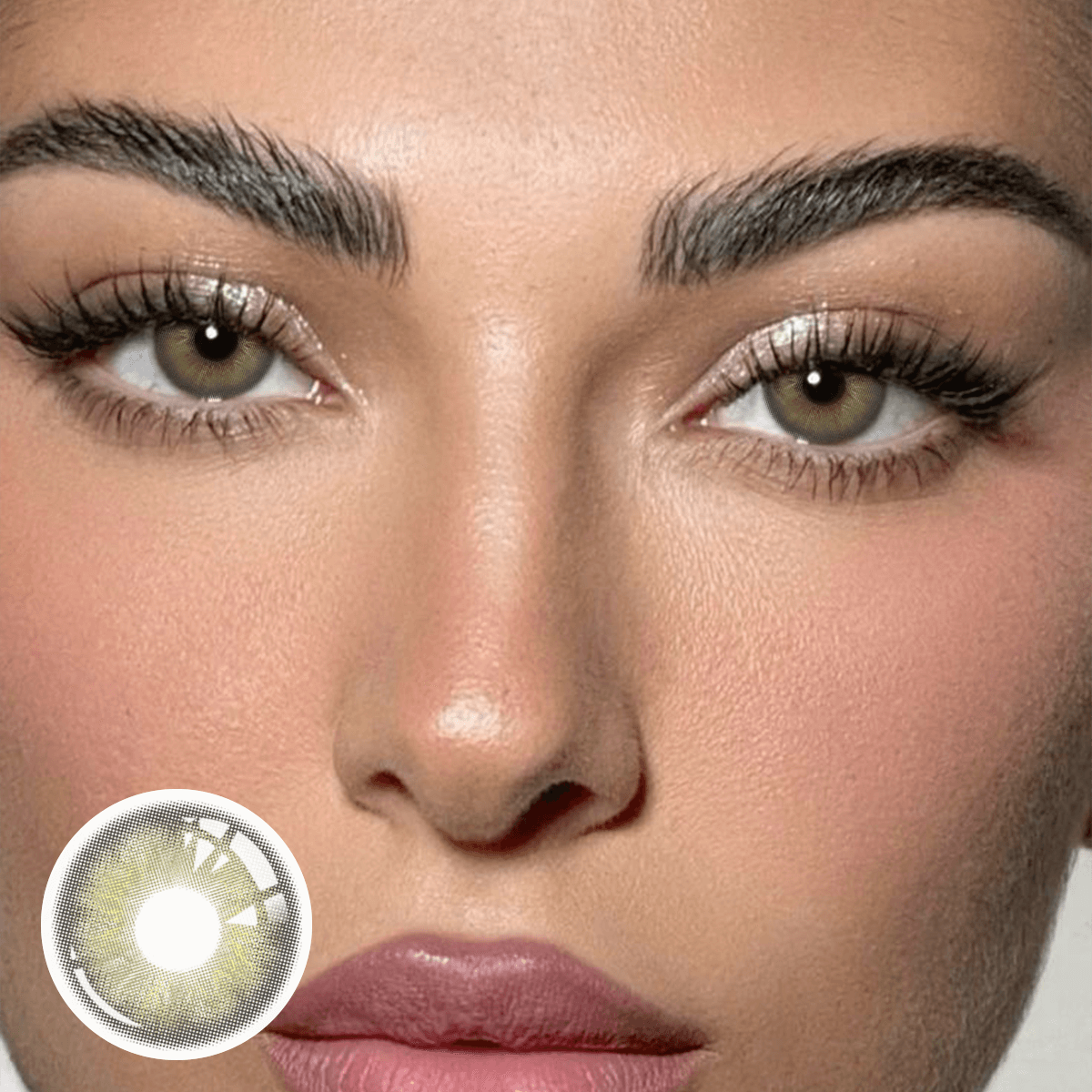 The girl's face is looking straight ahead, the upper left is the Wooeye logo, and the lower left is a close-up of the Irish.Green contact lens