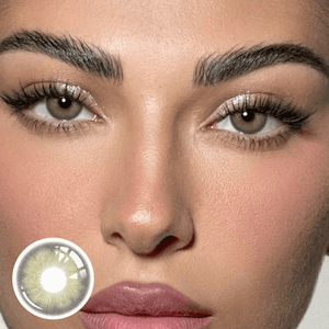 The girl's face is looking straight ahead, the upper left is the Wooeye logo, and the lower left is a close-up of the Irish.Green contact lens