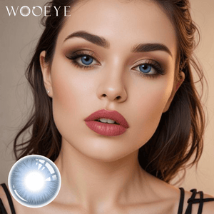 The girl's face is looking straight ahead, the upper left is the Wooeye logo, and the lower left is a close-up of the NutBlue contact lens