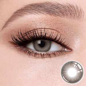 Nut Brown contact lenses on the eyes, close-up of the product on the lower right