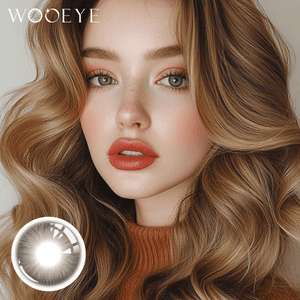 The girl's face is looking straight ahead, the upper left is the Wooeye logo, and the lower left is a close-up of the Nut Brown contact lens