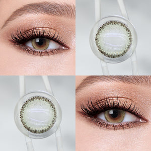 Brown eyes wearing Oat Gray Contact Lenses