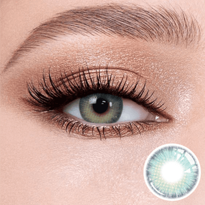 Romantic.Blue contact lenses on the eyes, close-up of the product on the lower right