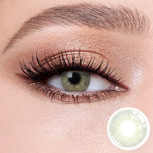 Taylor Green contact lenses on the eyes, close-up of the product on the lower right