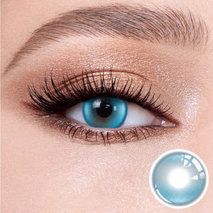 The effect of wearing Halo Pro Blue Contact Lenses, with a close-up of the product in the lower right corner