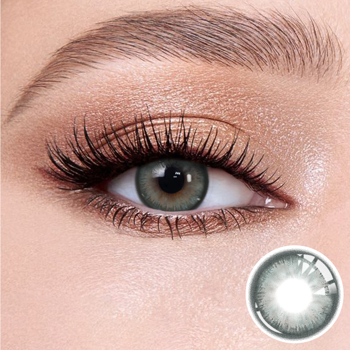 The effect of wearing Mystery Gray Contact Lenses, with a close-up of the product in the lower right corner