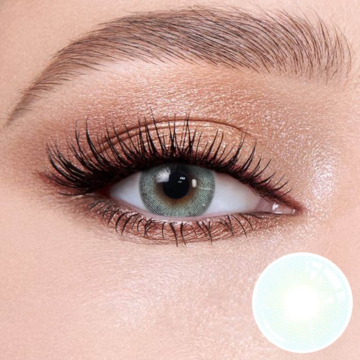 Mousse Blue contact lenses on the eyes, close-up of the product on the lower right