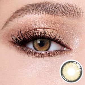 The effect of wearing Sugar Brown Contact Lenses, with a close-up of the product in the lower right corner