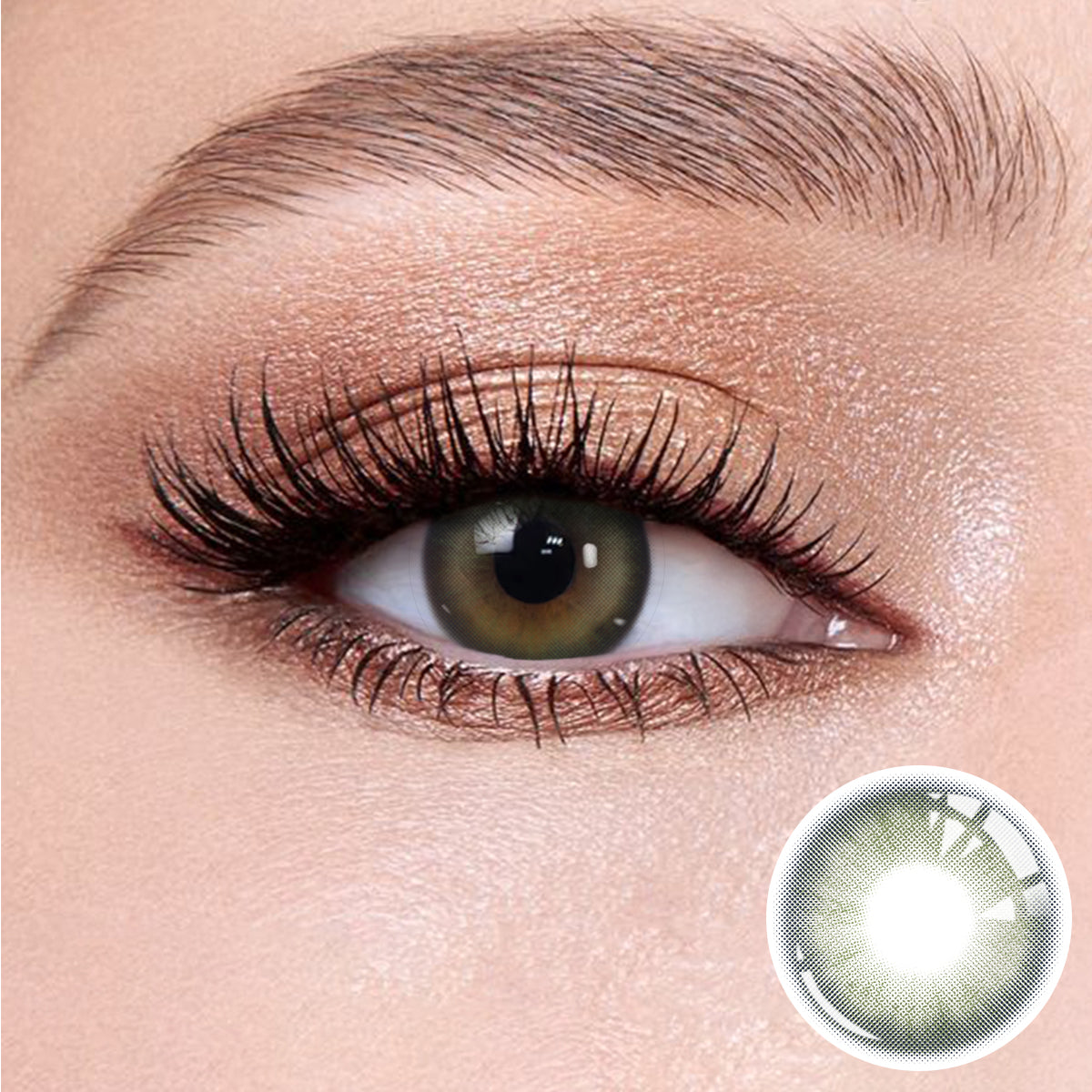 The effect of wearing Mystery Green Contact Lenses, with a close-up of the product in the lower right corner