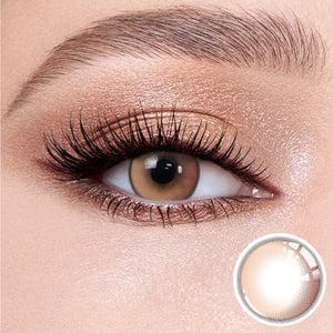 The effect of wearing Soul Pink Contact Lenses, with a close-up of the product in the lower right corner