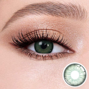 Elf Green contact lenses on the eyes, close-up of the product on the lower right