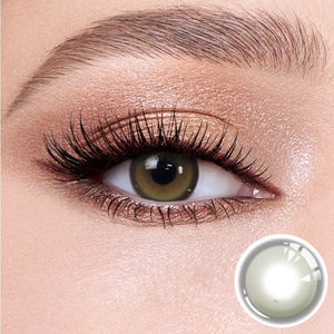 The effect of wearing Master Green Contact Lenses, with a close-up of the product in the lower right corner