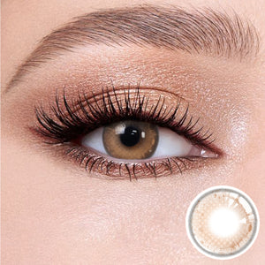 The effect of wearing Soul Brown Contact Lenses, with a close-up of the product in the lower right corner