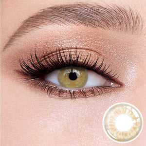 The effect of wearing Delicious Honey Brown Contact Lenses, with a close-up of the product in the lower right corner