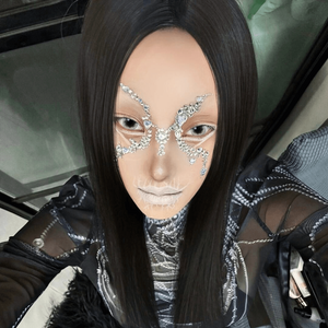 The girl's face is looking straight ahead, Wearing Halloween black and white contact lenses