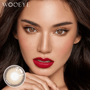 The girl's face is looking straight ahead, the upper left is the Wooeye logo, and the lower left is a close-up of the ciass brown contact lens